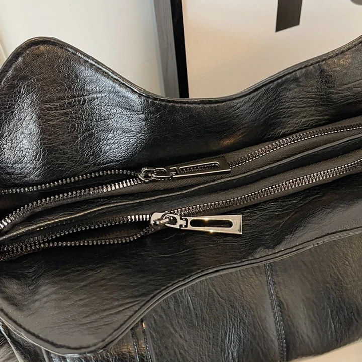 Dual-zipper large-capacity shoulder bag, black with front zipper pulls and zipper track