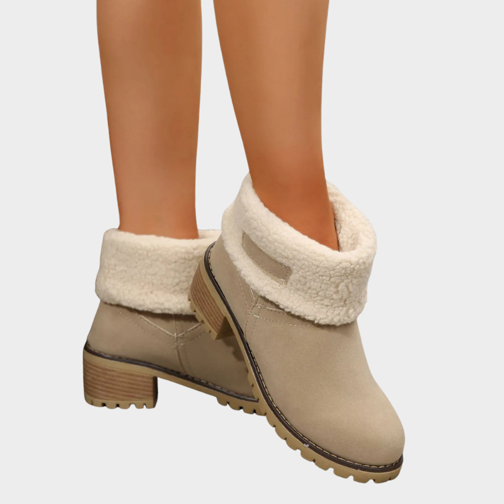 Taupe suede mid-heel winter boots with oversized white sherpa cuff and block heel