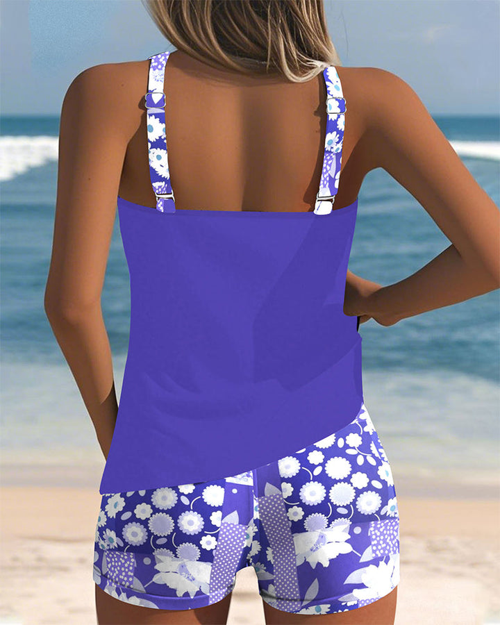 Back view purple swimsuit tank top with printed boxer shorts and floral strap details
