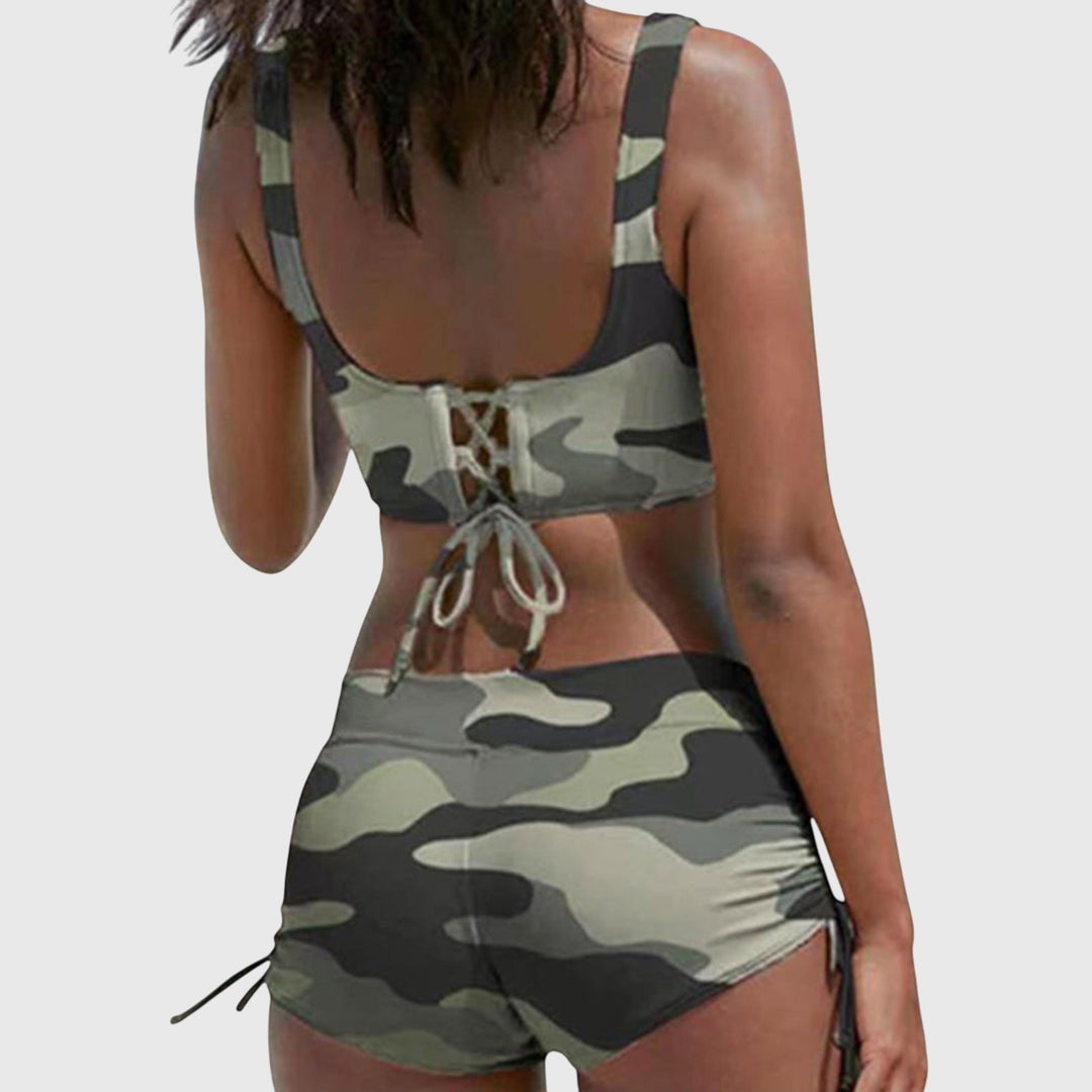 Camouflage bikini set shown from back with lace-up cross back and ruched side-tie shorts