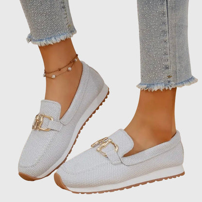 White textured loafer sneakers with gold-toned buckle detail