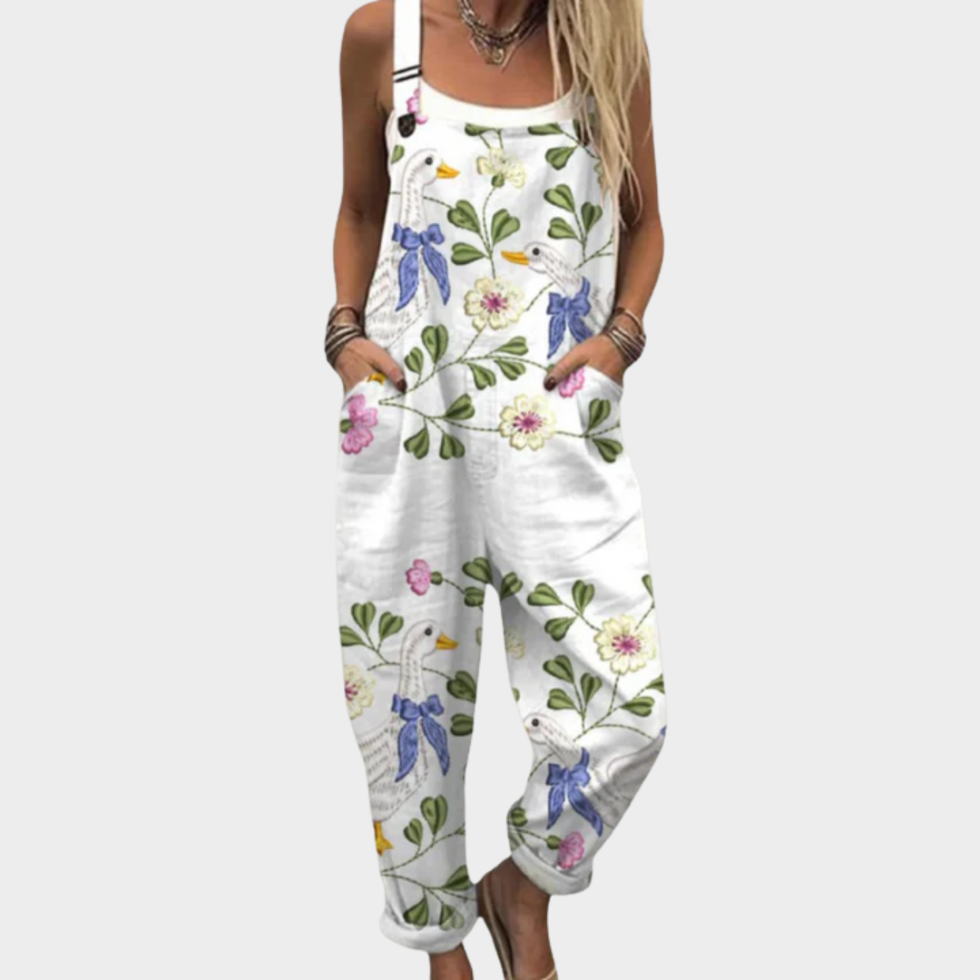 White printed sleeveless overalls with bird, floral and butterfly pattern