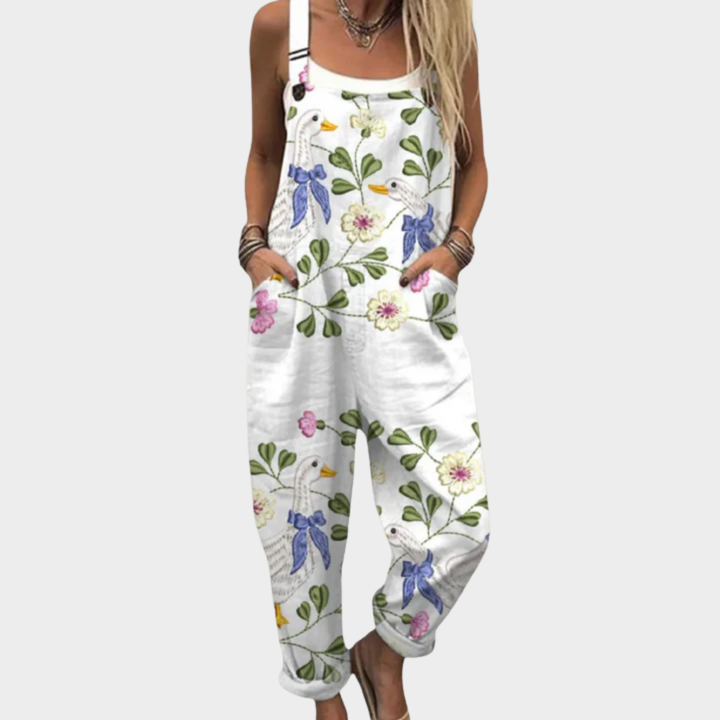 White printed sleeveless overalls with bird, floral and butterfly pattern