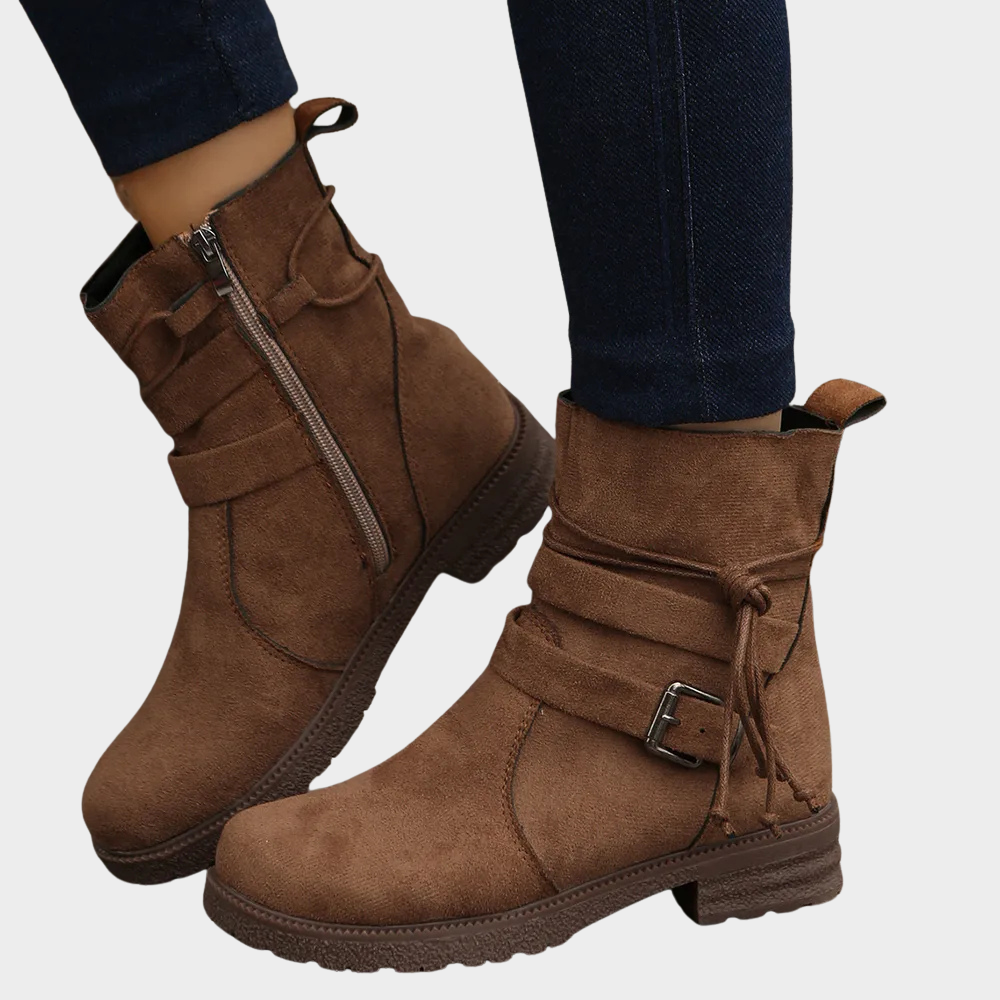 Brown low-heel ankle boots with side zipper, pull tab, and ankle lace tie