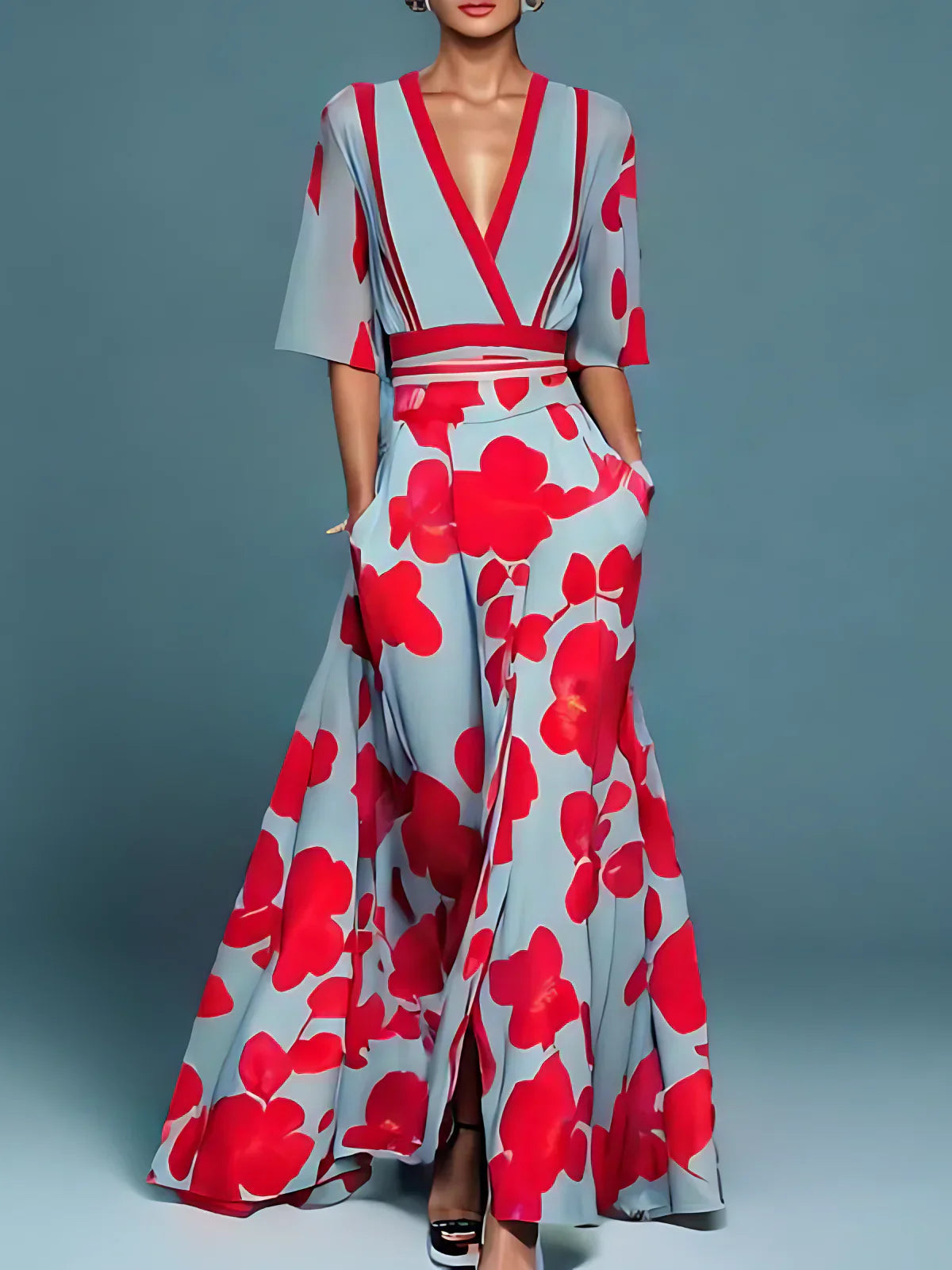 Floral maxi dress in light blue with bold red floral print, V-neck, short sleeves, waist sash