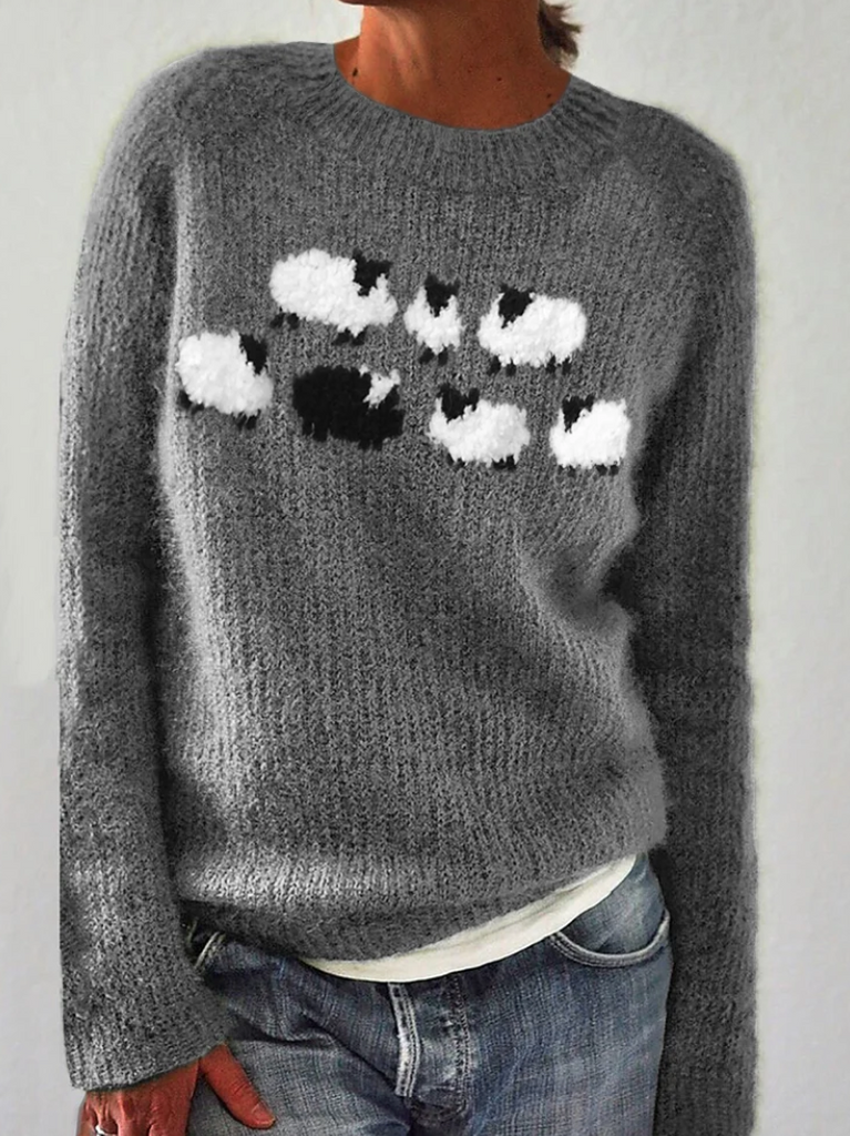 Gray knit crewneck sweater with long sleeves and black/white animal graphic on chest