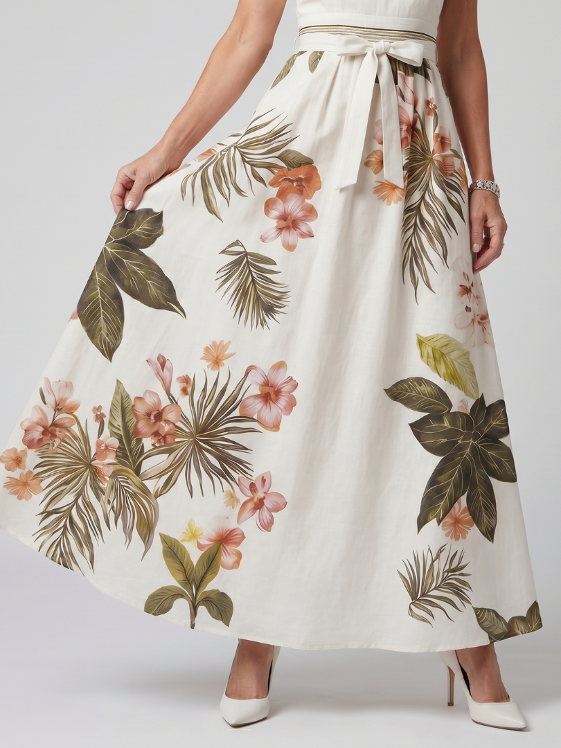 White botanical maxi skirt with waist tie and full floral print flare