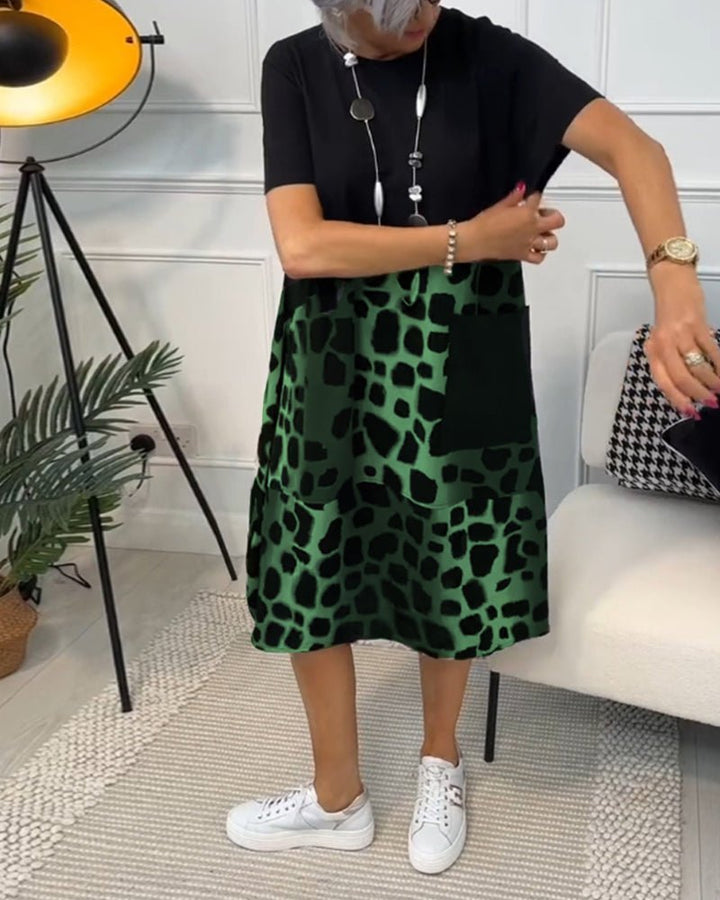 Women’s midi dress with black top and green leopard-print skirt, relaxed fit