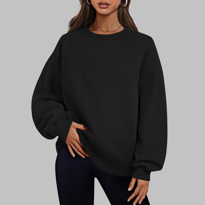Black oversized crewneck long sleeve sweater with ribbed cuffs and hem