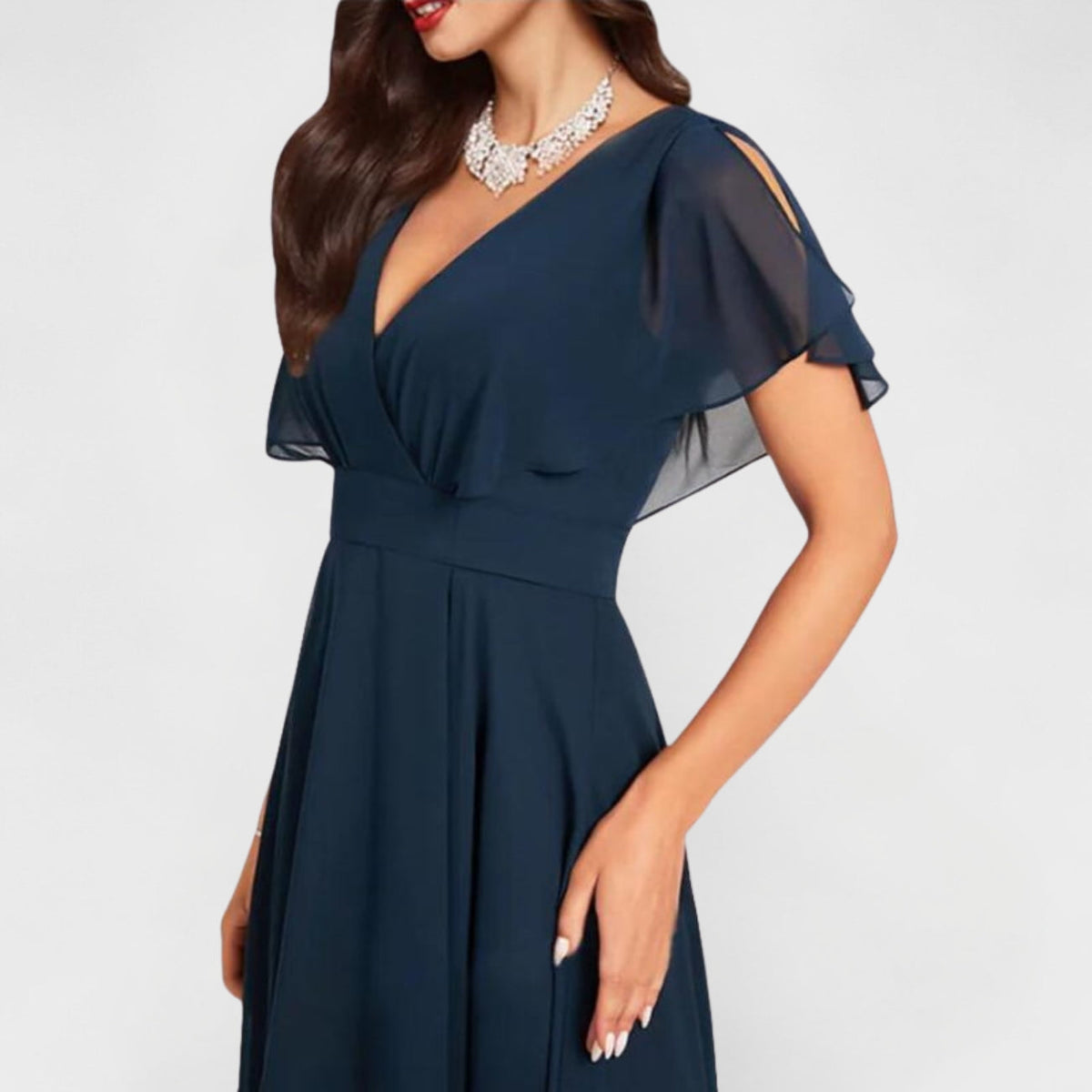 Navy V-neck maxi dress bodice with ruching at waist and sheer flutter sleeves