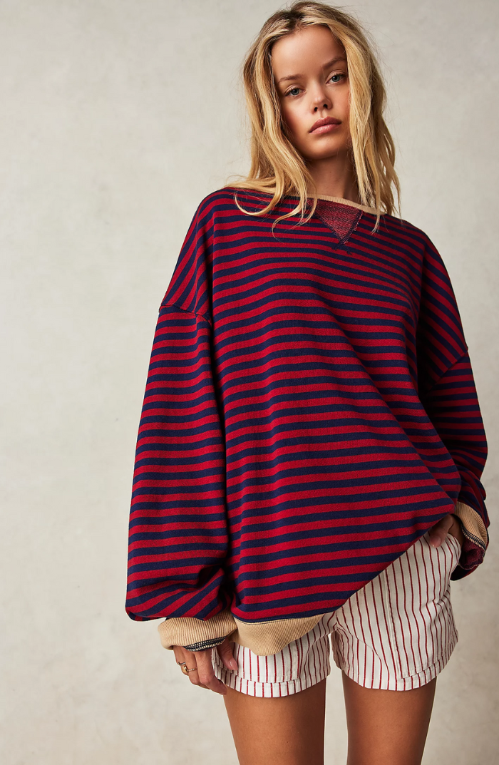 Striped sweater with navy and red horizontal stripes, loose fit, ribbed cuffs and hem