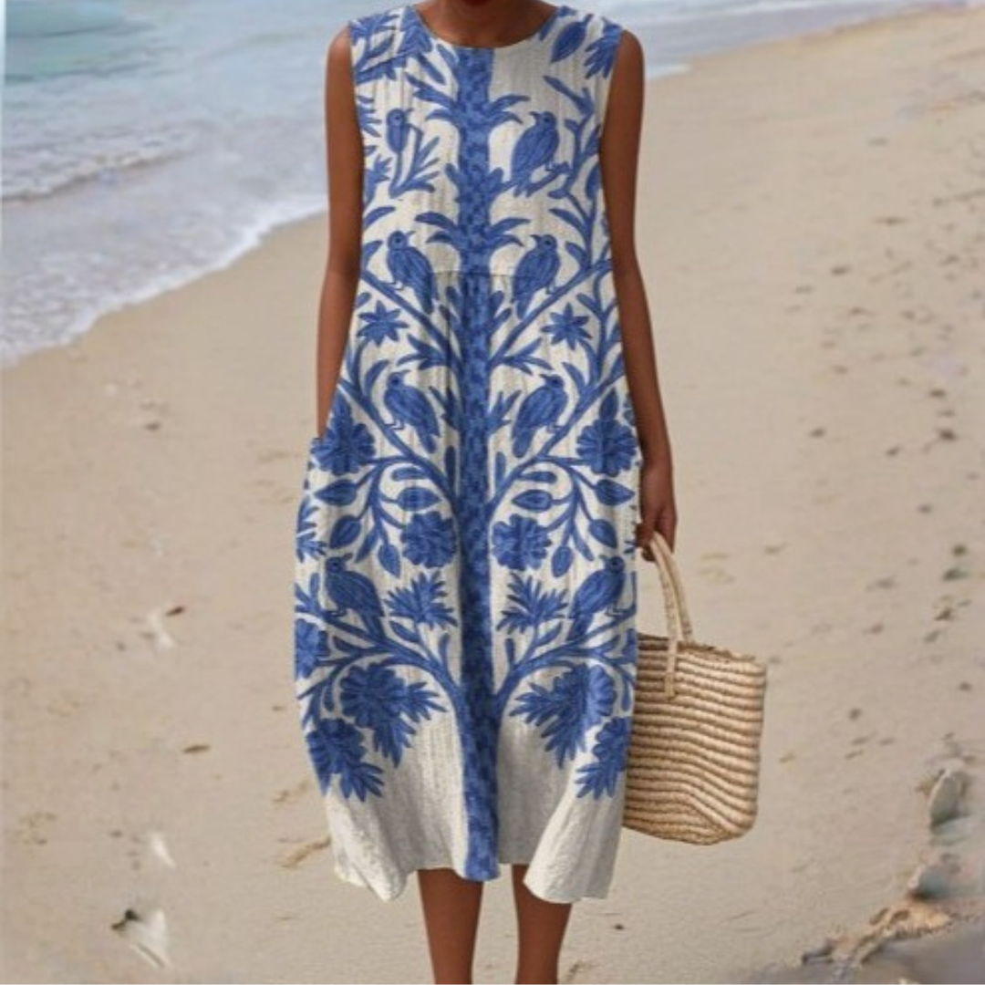 Sleeveless summer dress, blue and white palm print, round neckline, midi length
