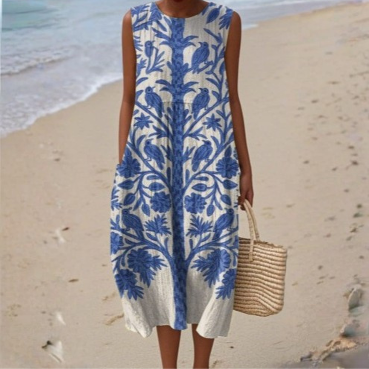 Sleeveless summer dress, blue and white palm print, round neckline, midi length