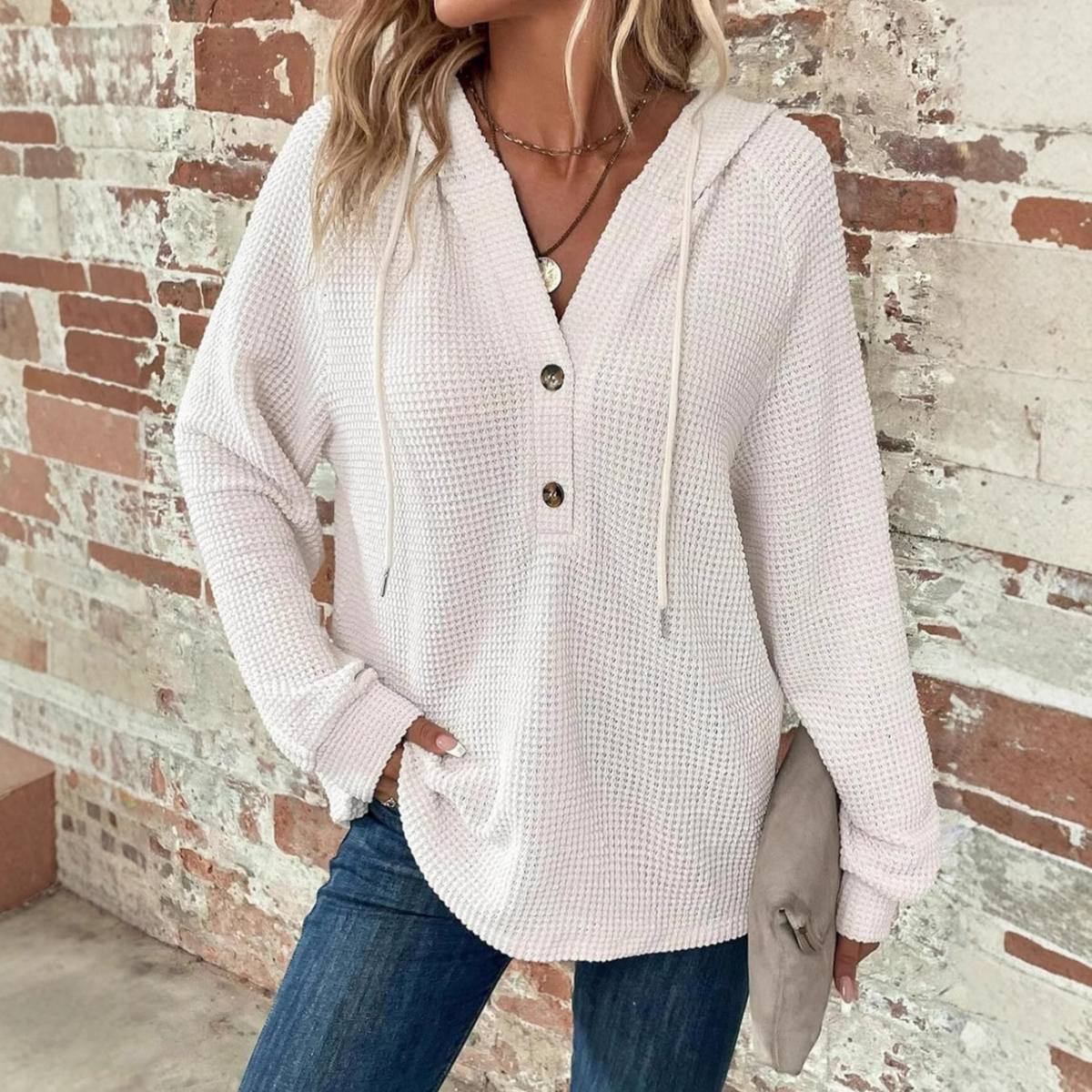 White waffle-knit hoodie with V-neck and button placket, long sleeves