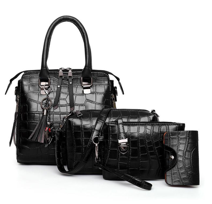 Black croc-pattern 4-piece handbag set with top handle, shoulder strap, and wrist pouch