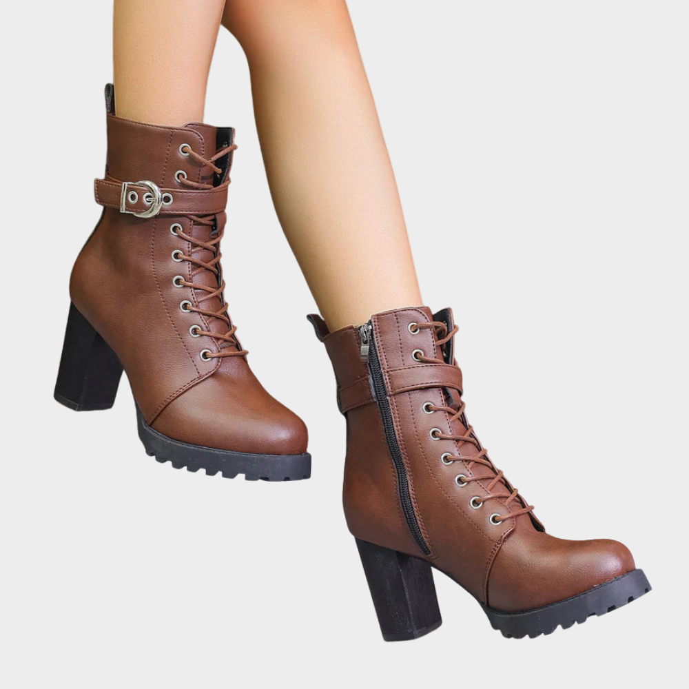 Brown flared heel ankle boots with lace-up front, side zip, and buckle strap