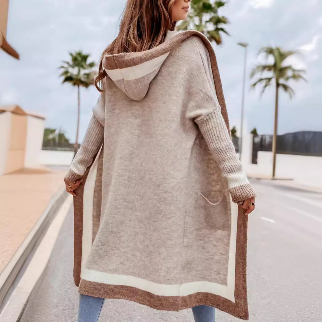 Back view oversized hooded cardigan in taupe with brown stripe trim and long sleeves