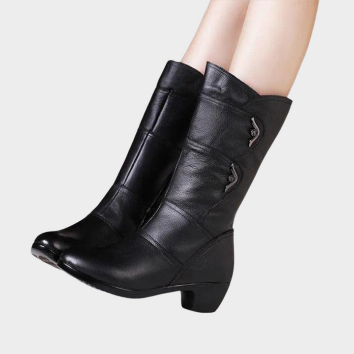 Black zip-up ankle boots with stacked heel and cuff strap closure