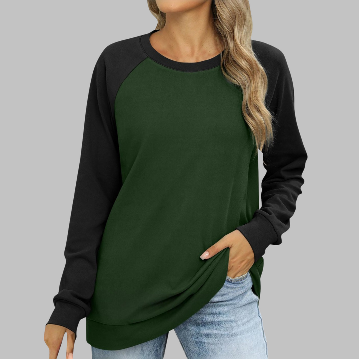 Two-tone raglan sweatshirt, round neck, long sleeves; dark green body, black sleeves