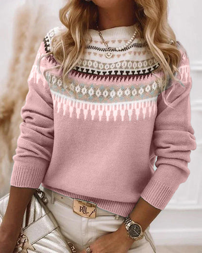 Pink Fair Isle knit sweater with patterned yoke and fair isle bands across the chest