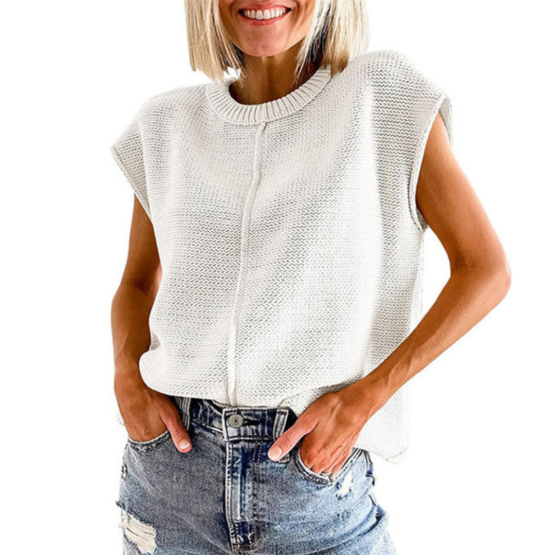 White sleeveless crewneck knit top with ribbed collar and center seam