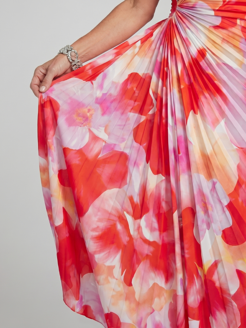 Floral midi dress with gathered pleats and colorful red, pink, and cream pattern