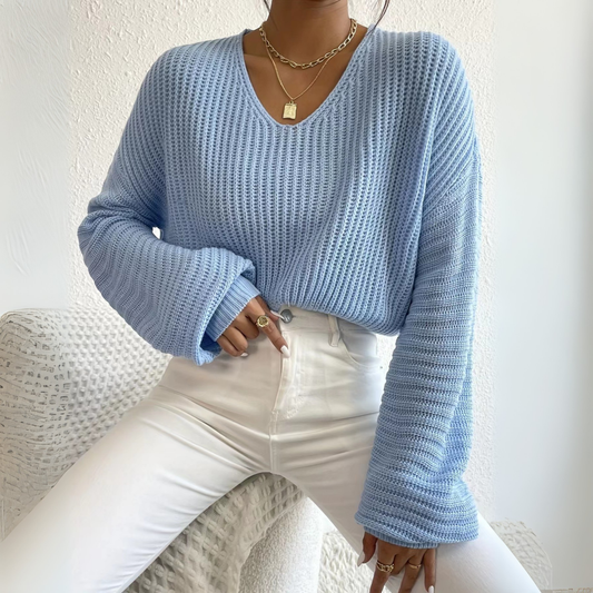 Sky blue knit V-neck long-sleeve sweater with ribbed cuffs and hem
