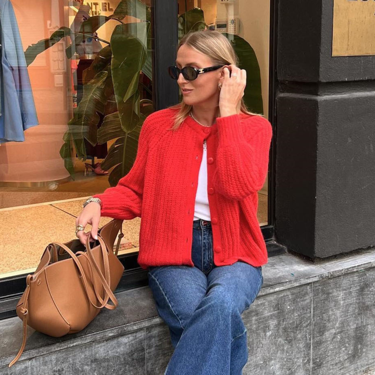 Red button-front round-neck long-sleeve cardigan with ribbed knit texture