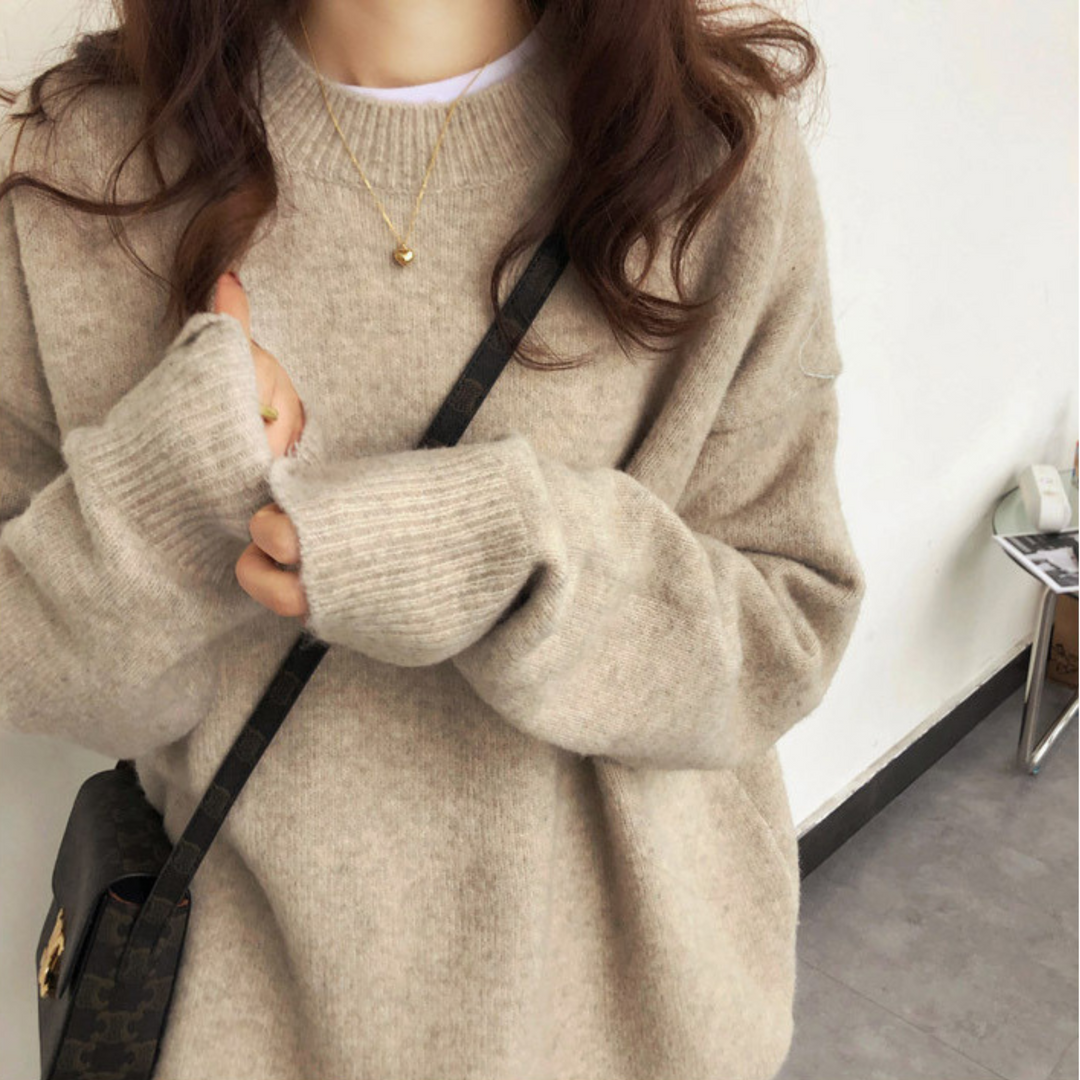 Heather beige casual long-sleeve sweater with round neck and ribbed cuffs