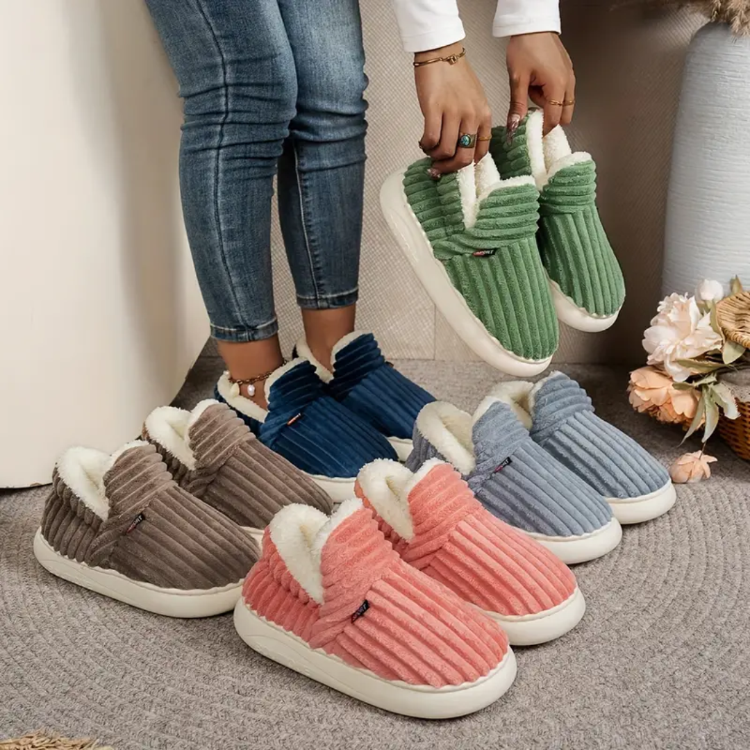 Comfort slippers in multiple colors: brown, pink, blue, grey, and green with white lining