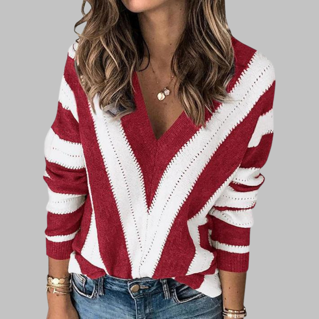 Red V-neck striped long-sleeve sweater with white chevron zigzag stripes