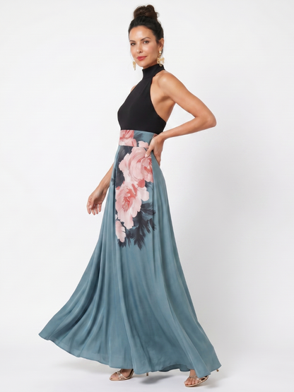 Black halter maxi dress with teal skirt and pink floral print, full length