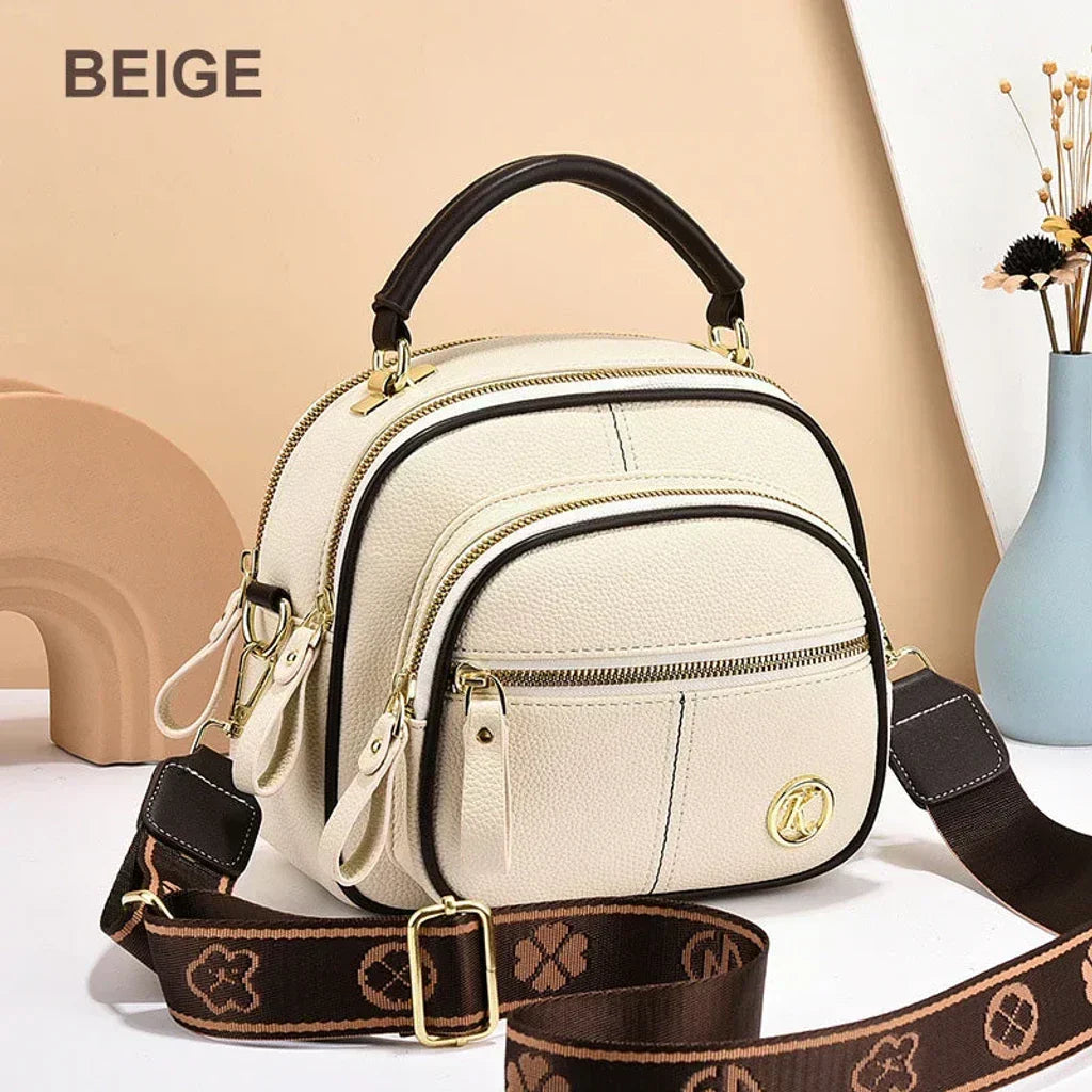 Mini chic crossbody shoulder bag in beige with gold-tone hardware and zip compartments