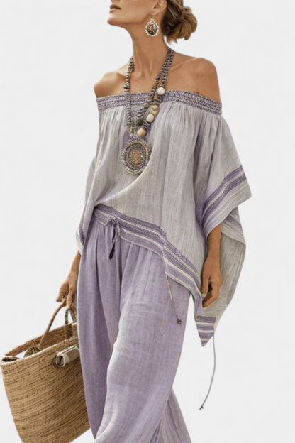Lavender striped wide-leg trousers with drawstring waist, wide flared legs, and pockets