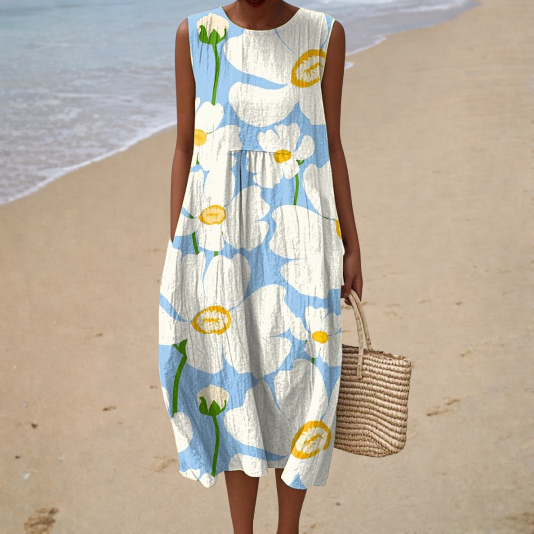Sleeveless summer dress with blue and white floral print, round neckline, midi length