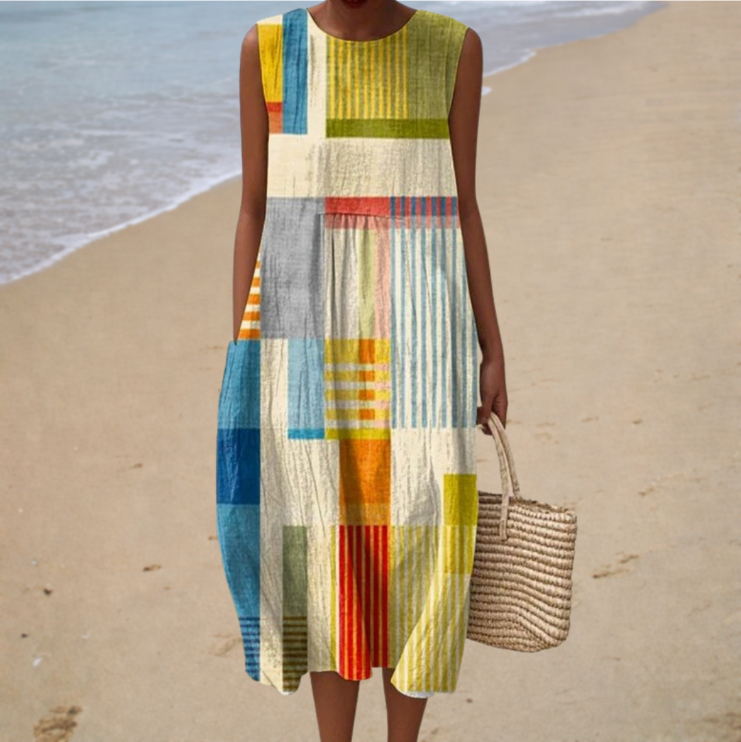 Sleeveless patchwork summer dress with round neckline, multicolor vertical stripes.