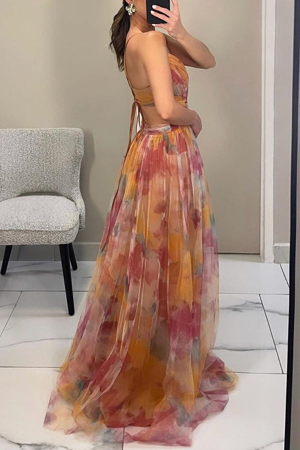 Multicolor maxi dress with V-neck, crossover sash and tiered pleated skirt