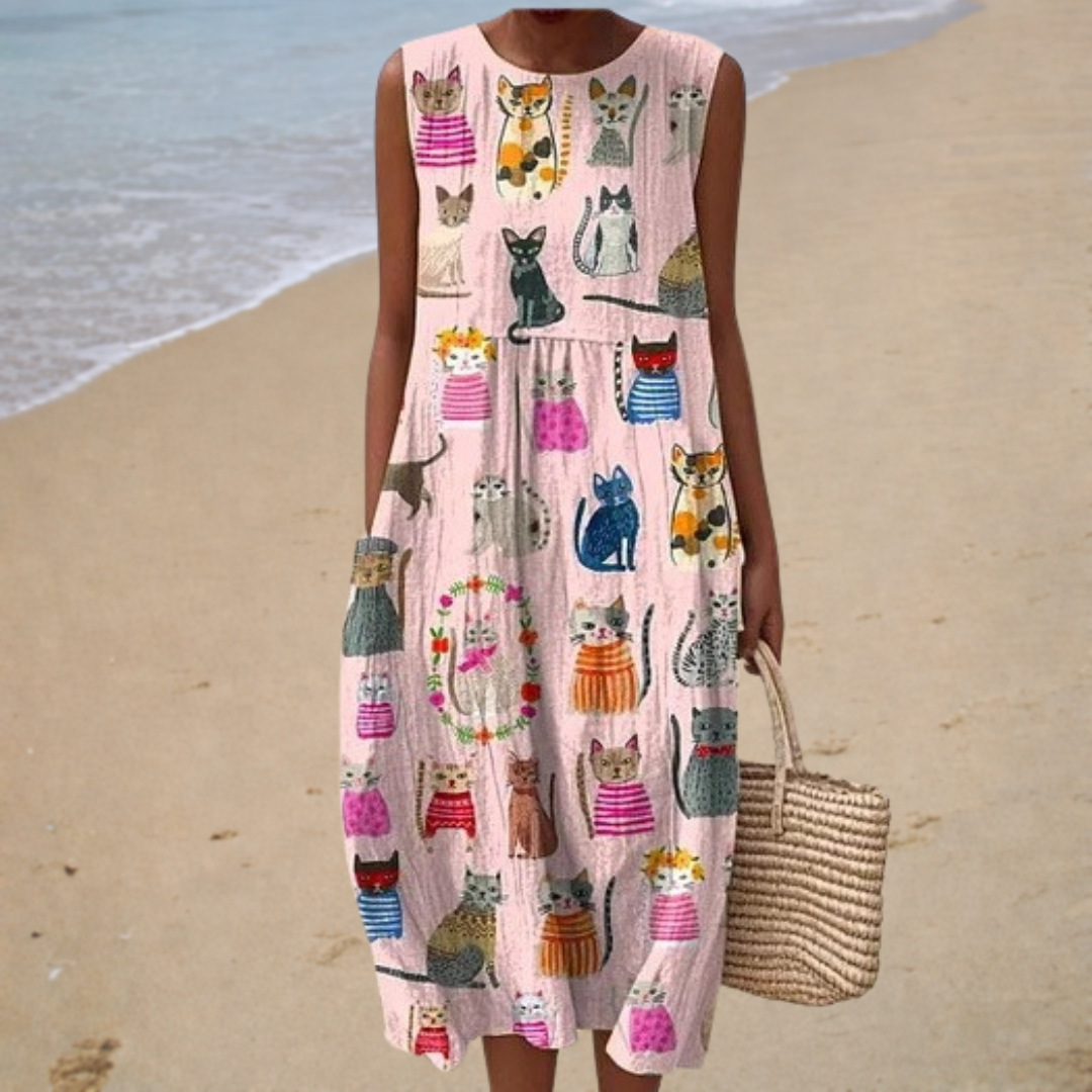 Sleeveless summer dress in light pink with colorful cat print, loose A-line fit