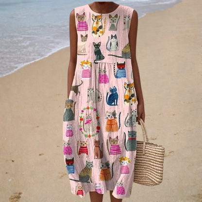 Sleeveless summer dress in light pink with colorful cat print, loose A-line fit