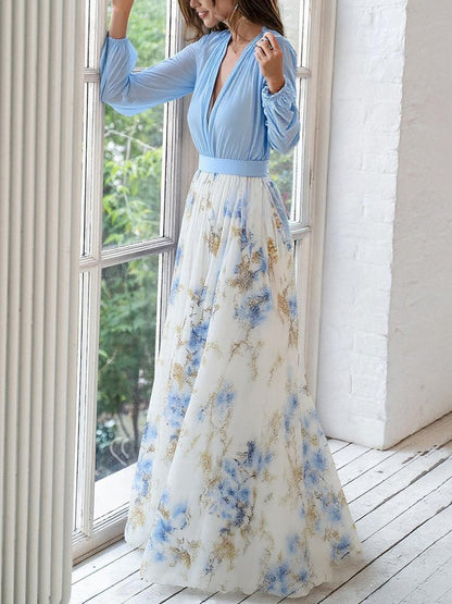 Floral maxi dress with long-sleeve light blue top, V-neck, and ankle-length skirt