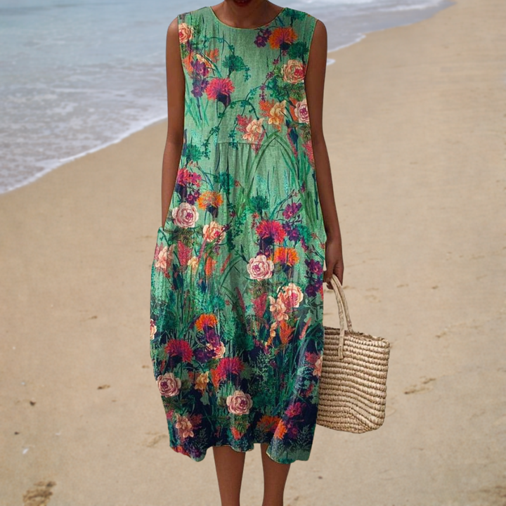 Teal floral sleeveless summer dress with round neckline, midi length