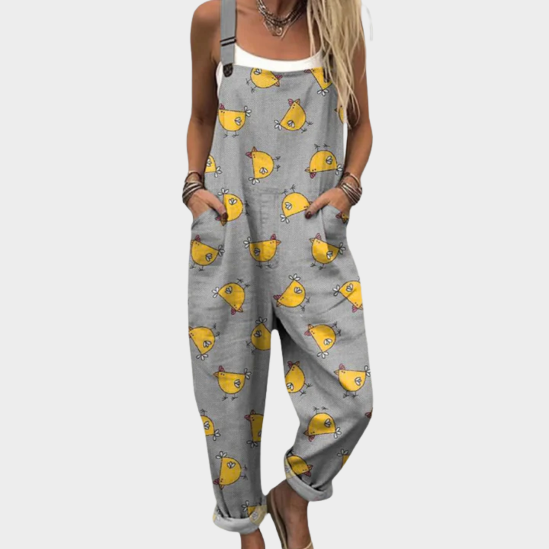 Gray printed overalls with yellow bird faces, loose fit and adjustable straps