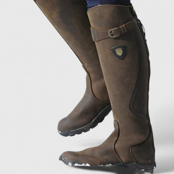 Brown orthopedic boots close-up with adjustable strap and logo patch