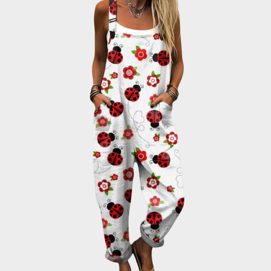 White printed overalls with ladybugs and red flowers, sleeveless straps
