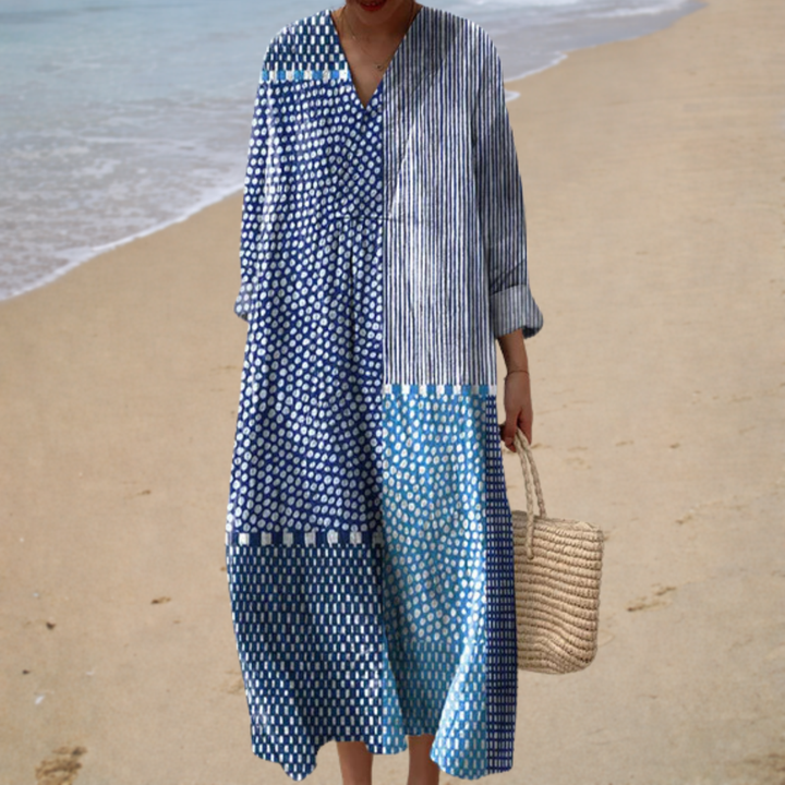 Blue and white printed summer dress with button front, V-neck, and long sleeves
