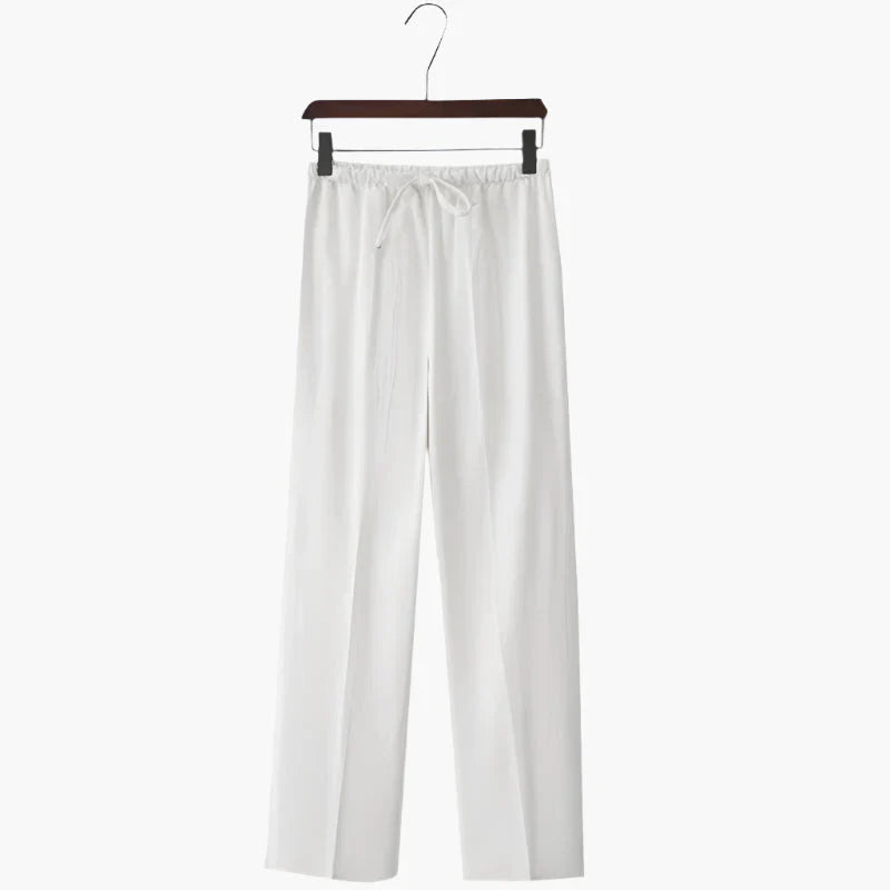 White linen pants on hanger, elastic drawstring waist with relaxed wide legs