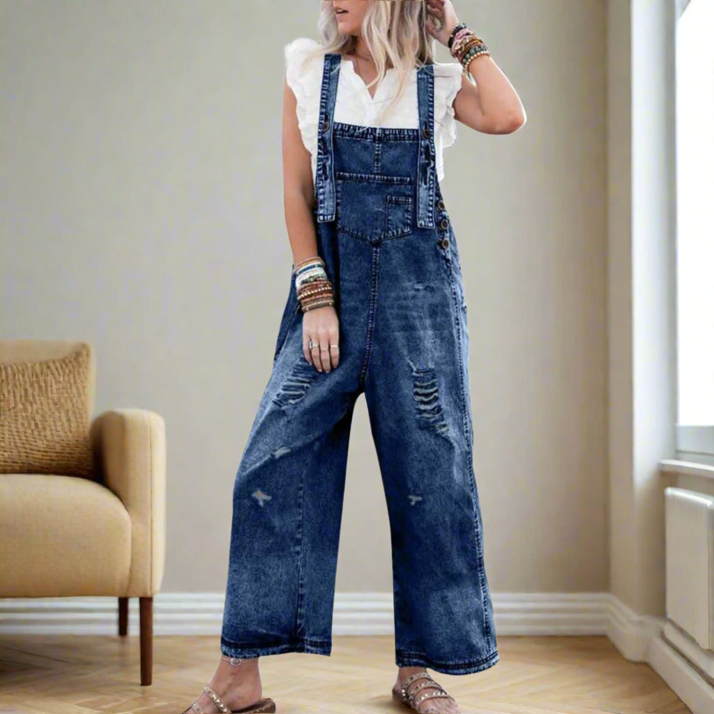 Vintage-wash denim adjustable jumpsuit, medium blue with distressed bib and straps