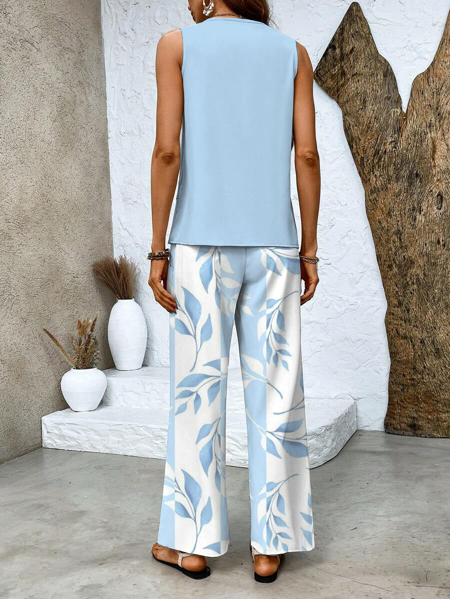 Light blue sleeveless back blouse and leaf-print wide-leg trousers, two-piece set