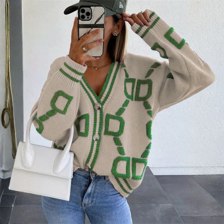 Beige button-down cardigan with green geometric pattern, V-neck, long sleeves, button front
