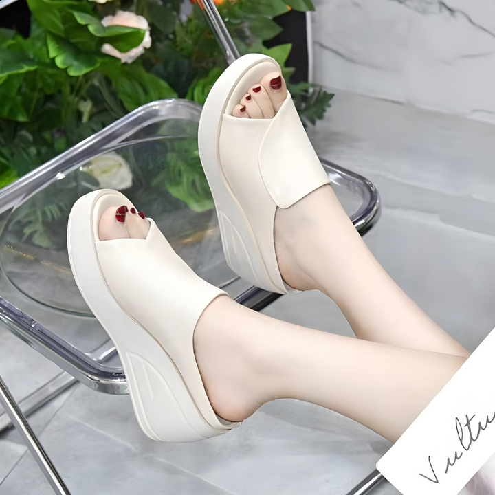 Beige orthopedic sandals with open toe, wide strap, thick platform sole